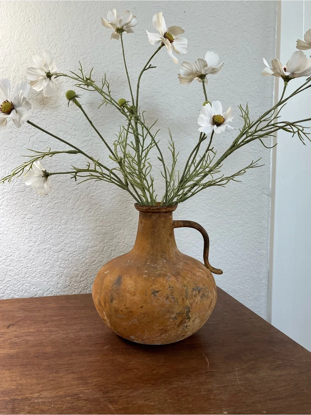 Antique distressed metal jug